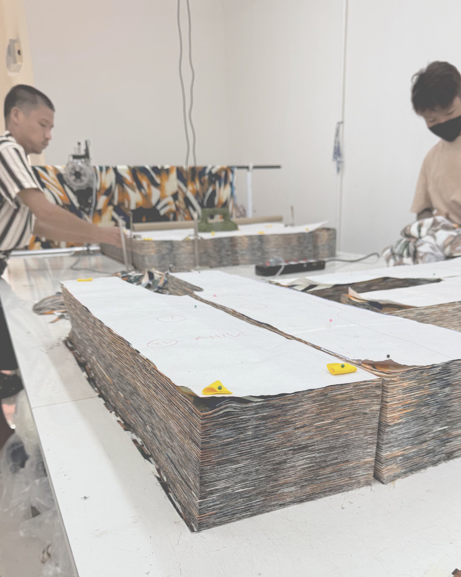 890 Factory team cutting fabric in production